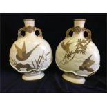 A pair of late 19th Century Royal Worcester Moon Flasks
