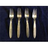 A set of four Georg Jensen silver forks (231g)