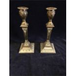 A pair of Neo Classical style silver candlesticks, hallmarked London 1905