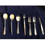 A selection of silver spoons and forks including Georg Jensen