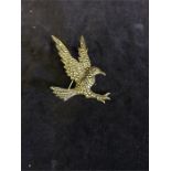 A silver and marcasite brooch of an eagle