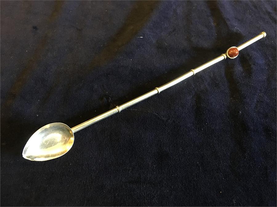 A long silver spoon