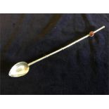 A long silver spoon