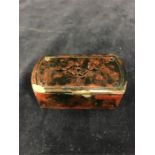 A small rectangular papier mache snuff box