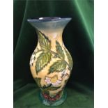 A Moorcroft vase 20 cm 'Fruit Garden'