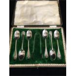 A Boxed set of silver teaspoons and sugar nips, Makers Mark B.B Birmingham 1903-1904