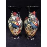 A pair of 2005 Moorcroft butterfly vases