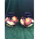 A pair of Moorcroft mushroom vases