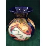 A small Moorcroft carp vase