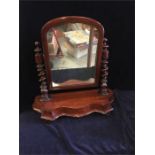 A Mahogany toilet mirror