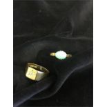 Two 18ct gold rings both set with stones one diamond, total weight 8.5g