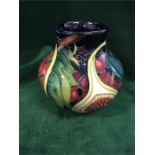 A small Moorcroft Queens Choice vase