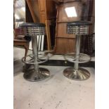 Pair of chrome and leather bar stools