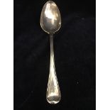 A silver serving spoon hallmarked London 1851-52 (89.8g) E.E makers mark.