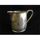 A silver milk jug (122.5g)