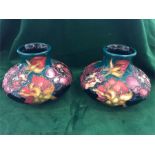 A pair of Moorcroft small vases 7cm