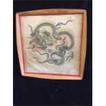 A 19th Century framed Chinese silk with Dragon embroidered motif.