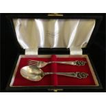 Boxed silver spoon and fork