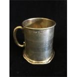 A small silver tankard by R & Co hallmarked Birmingham 1934-35 (62g)