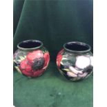 A Pair of small Moorcroft vases