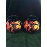 A pair of Moorcroft Amazon snake vases 2005