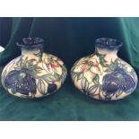 A Pair of low floral Moorcroft vases