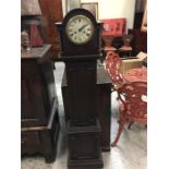 An oak 1920's 30 Hour grandmother clock