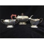 A silver tea set to include teapot, sugar bowl and milk jug by JB Chatterley & Sons Ltd hallmarked