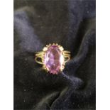 A 14ct gold ring with amethyst ring