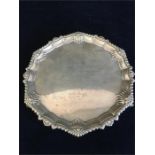 An engraved silver salver, hallmarked total weight 365g