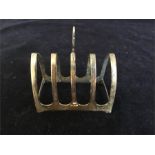 A silver toast rack, hallmarked Sheffield 1939/40