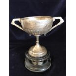 A silver cup, hallmarked Sheffield 1911 (Total cup weight without stand 385g)