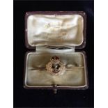A 15ct gold Naval sweetheart brooch with enamel and a 9ct gold clip