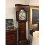 A Late 18th Century Oak Eight Day Longcase clock with a brass dial.