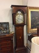 A Late 18th Century Oak Eight Day Longcase clock with a brass dial.