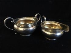 Silver sugar bowl and milk jug hallmarked London 1940-41 by The Goldsmiths and Silversmiths Co ltd