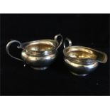 Silver sugar bowl and milk jug hallmarked London 1940-41 by The Goldsmiths and Silversmiths Co ltd