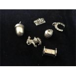 A selection of silver charms
