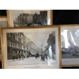 Four framed black and white photographs of London scenes.