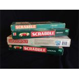 A selection of Vintage Scrabble games and a new boxed Monopoly