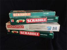 A selection of Vintage Scrabble games and a new boxed Monopoly