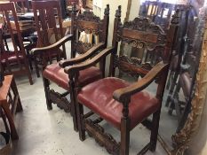 A Pair of carved, leather seated hall or carver chairs