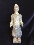 An Antique Chinese bottle in the shape of a man