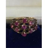 A Gold ring with semi precious stones