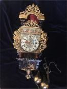 A Dutch wall mounted Ornate Clock