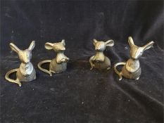 Four cast iron mice