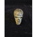 A Bronze walking stick head