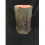 A small carved plinth