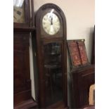 An Oak long case, Westminster Chimes clock