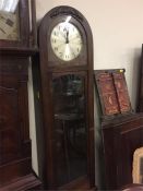 An Oak long case, Westminster Chimes clock